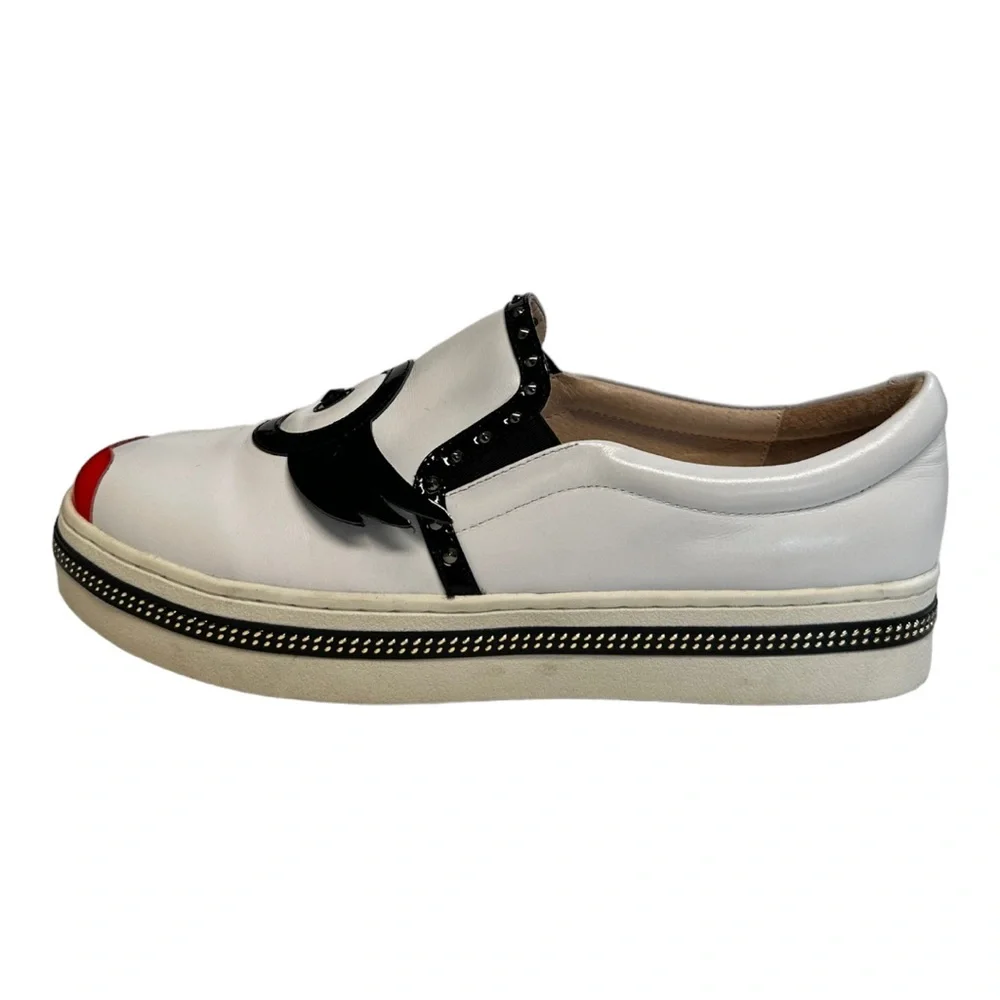 White Leather Slip-On Sneakers with Black Trim and Red Accent